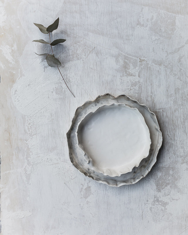 organic shaped plates with high rims hand made by clay beehive ceramics