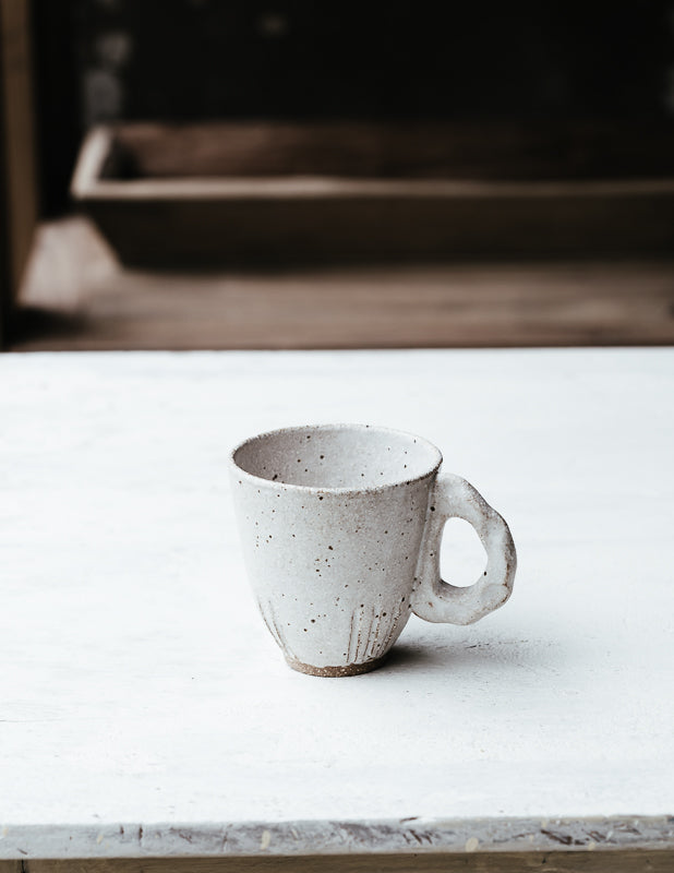 Ceramic stoneware cups hand crafted on the pottery wheel by clay beehive ceramics