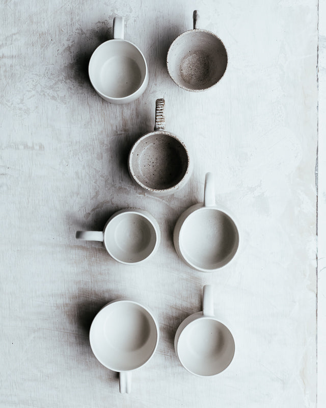 Ceramic stoneware cups hand crafted on the pottery wheel by clay beehive ceramics