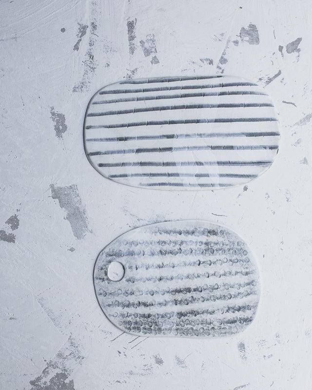 Platters / cheese boards with stripes textured ceramics by clay beehive