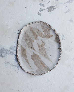 Oval rustic ceramic plates with textured edging and satin white glaze created by clay beehive ceramics