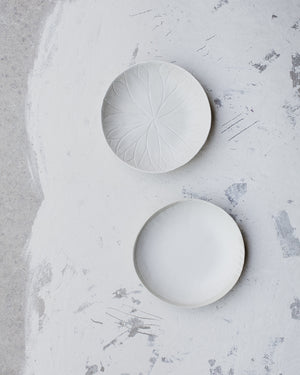 Textured satin white bowls wide and low crafted by clay beehive ceramics