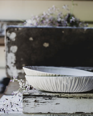 Textured satin white bowls wide and low crafted by clay beehive ceramics
