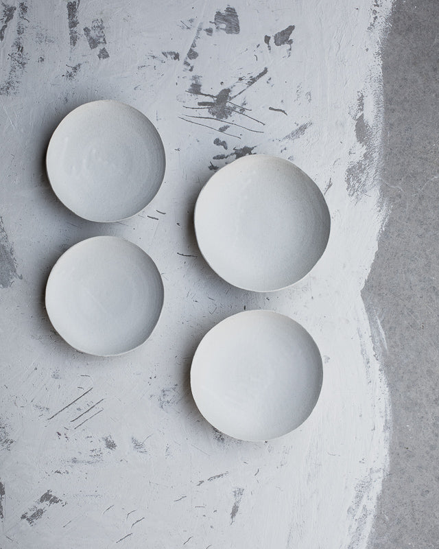 matte white footed ceramic bowls by clay beehive 