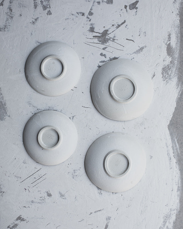 matte white footed ceramic bowls by clay beehive 