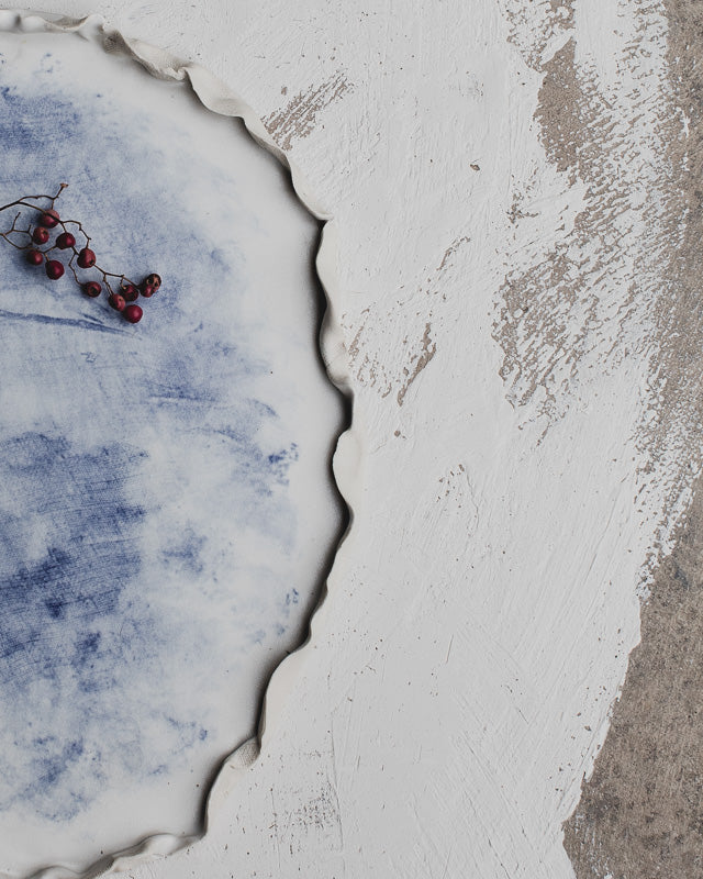 oval ceramic plate blue and white frilly rims by clay beehive pottery