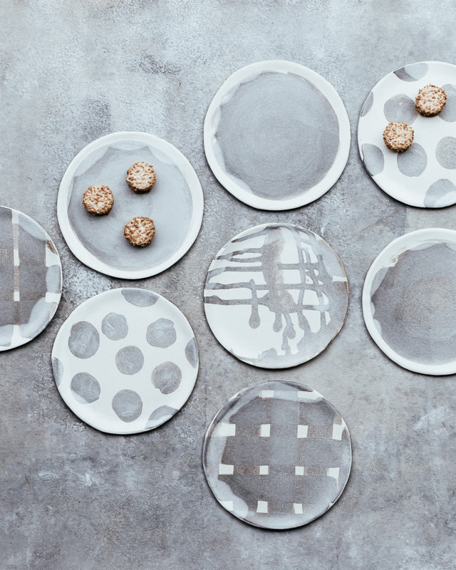 small hand made plates with matte gray and white glaze perfect for cakes and snacks by clay beehive ceramics 