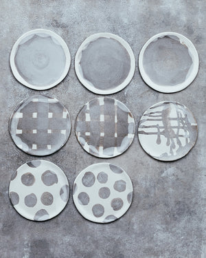 small hand made plates with matte gray and white glaze perfect for cakes and snacks by clay beehive ceramics 