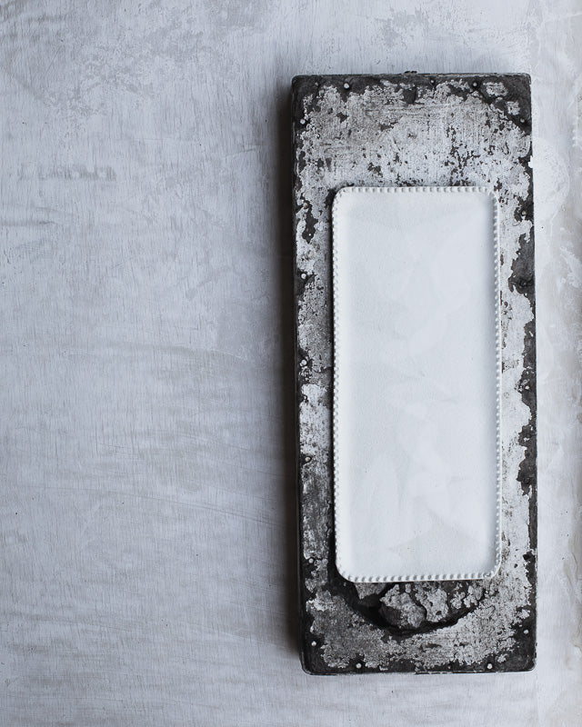satin white glazed rectangle plate platter with textured cookie cutter rim hand made by clay beehive ceramics