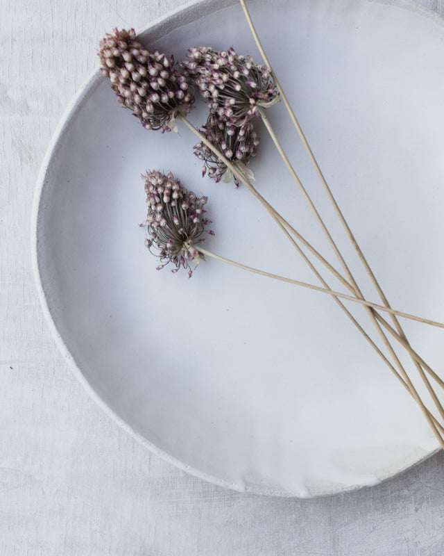 large bowl hand made out of sandy clay and glazed in a satin white by clay beehive ceramics
