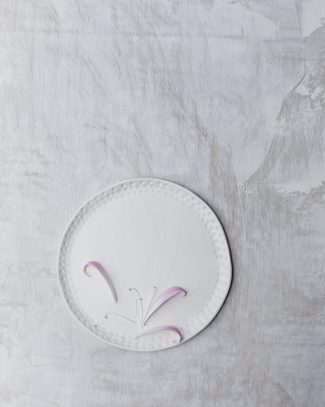 satin white plate handmade with carved rim and texture by clay beehive ceramics