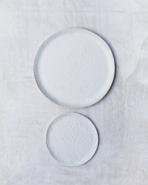 Satin white plates with texture and handmade by clay beehive ceramics