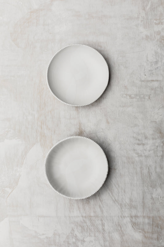 satin white hand made ceramic bowl with decorative edge by clay beehive