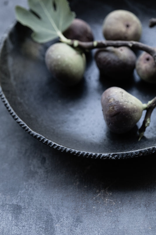 gritty black textured rim hand made ceramic bowl by clay beehive