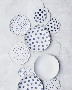 ceramic blue and white spot hand made plates with unique rims by clay beehive