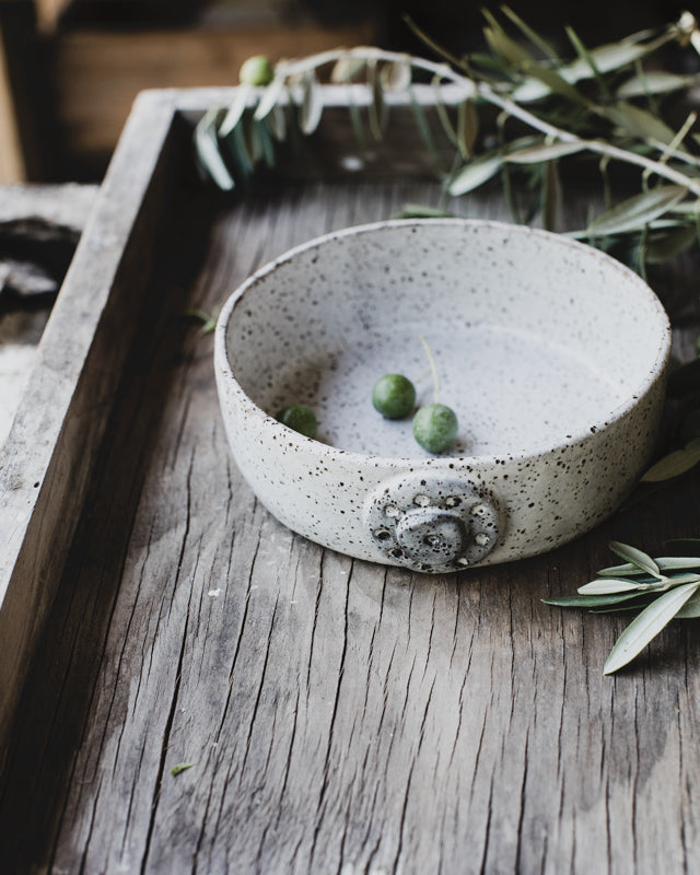 rustic ceramic dish made for baking and perfect for holding antipasto by clay beehive.