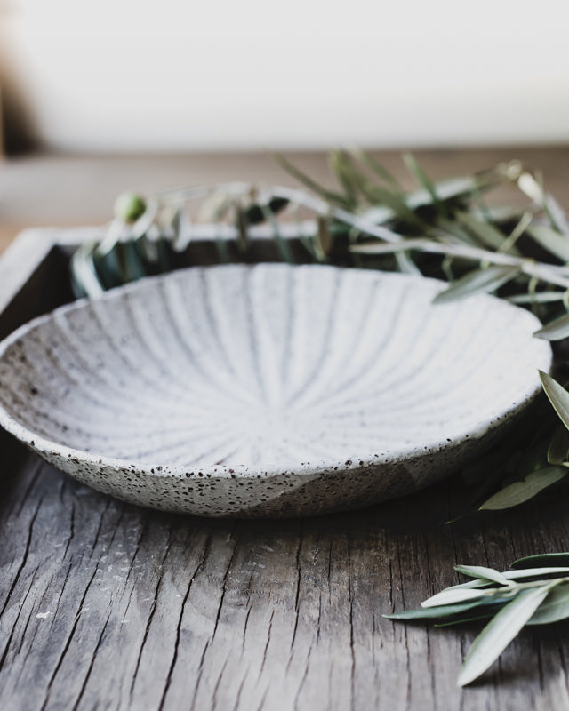 textured carved rustic bowl hand made ceramic by clay beehive