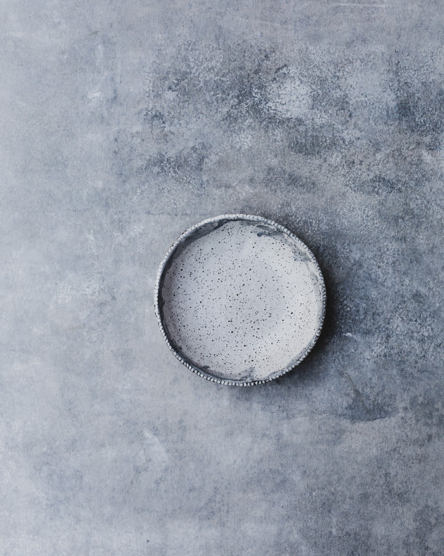 handmade rustic bowl with textured rim and grey / white glazing by clay beehive