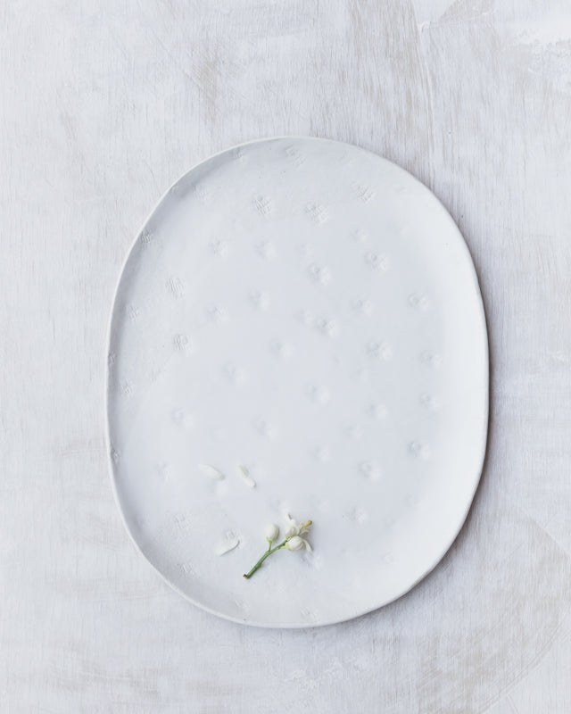 oval satin white hand made plate by clay beehive ceramics