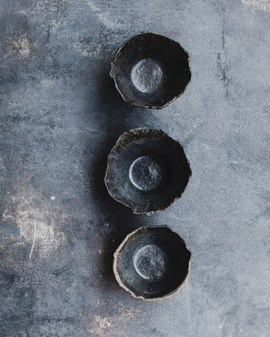 Black rustic bowls with a wabi sabi look hand made by clay beehive ceramics