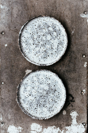 rustic hand made gritty plates with high straight rims and grey and white leopard print by clay beehive ceramics
