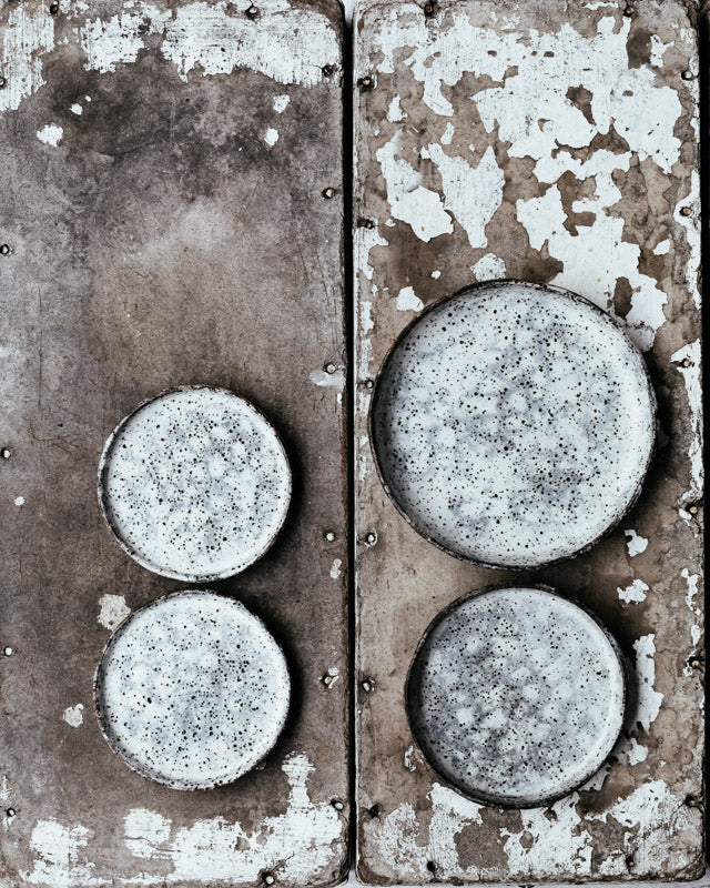 rustic hand made gritty plates with high straight rims and grey and white leopard print by clay beehive ceramics