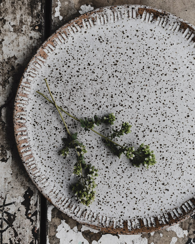 Rustic earthy speckled carved plates