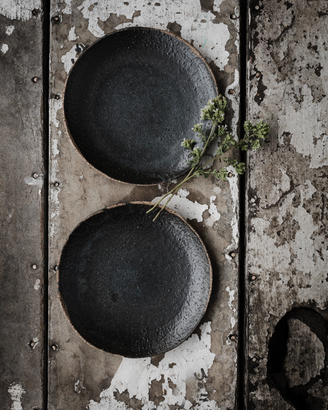 rustic hand made matte black gritty shallow bowls / plates perfect for tapas by clay beehive ceramics