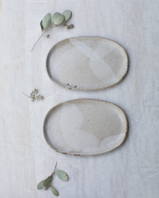 Cafe au Lait Oval plates with warmy toasty tones and textured edging