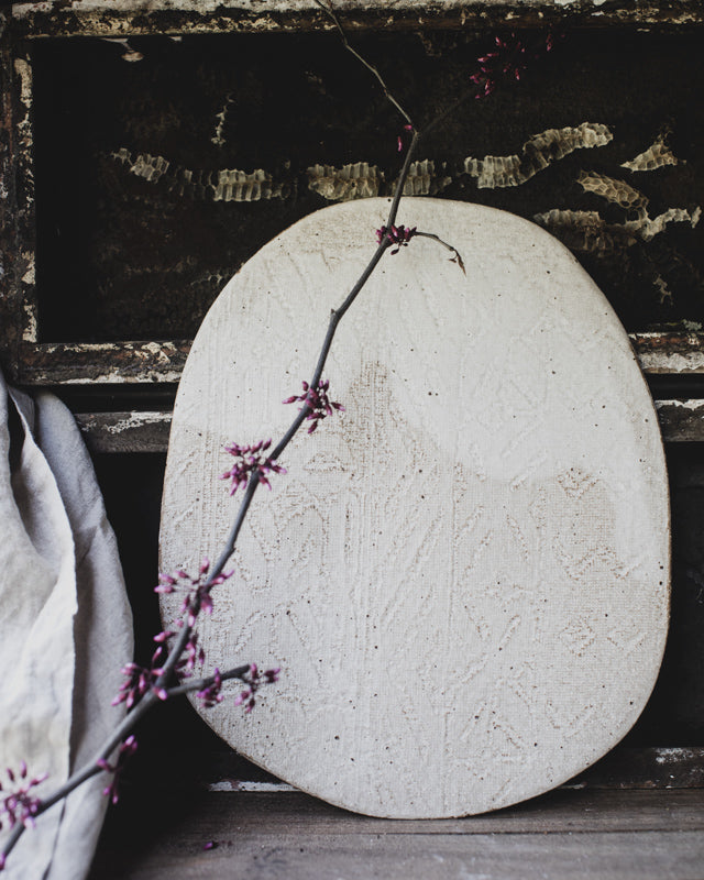 Textured cheese board handmade with stoneware clay by clay beehive ceramics