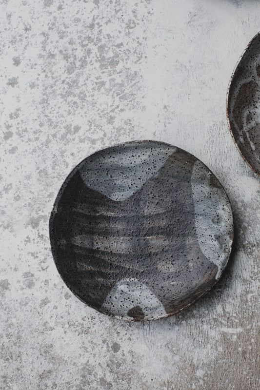 shallow bowls and plates with gritty clay handmade and perfect for tapas and sharing plates created by clay beehive ceramics