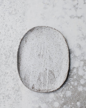 Rustic speckle oval serving plate platter with textured rim