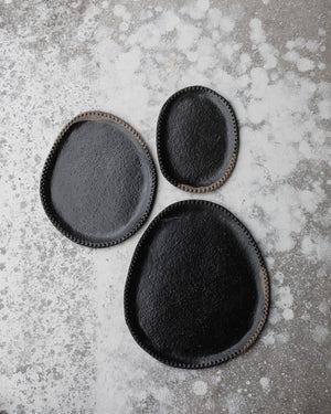 sharing plates black glaze over stoneware clay body by clay beehive ceramics