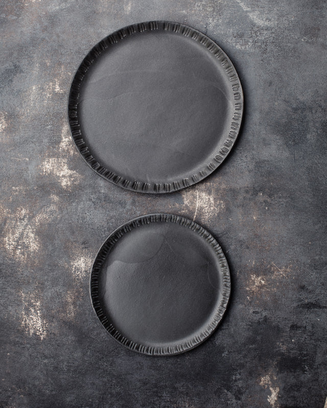 carved rims black ceramic plates hand crafted by clay beehive
