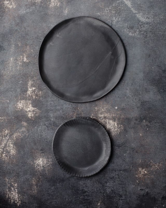Satin black plates with a flash of charcoal