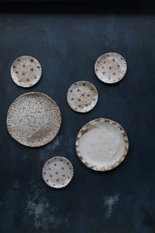 rustic gritty plate with detailed edge by clay beehive