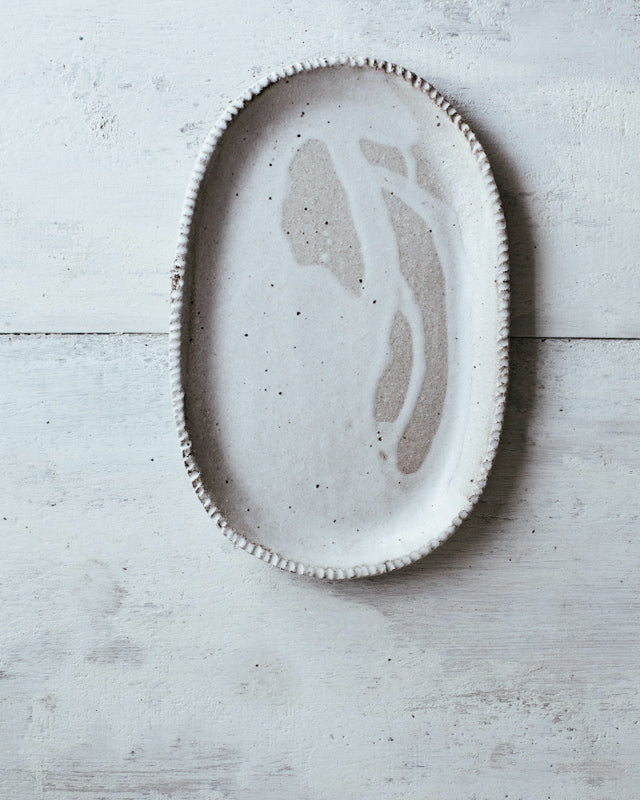 Rustic drippy satin white glazed oval texture plate