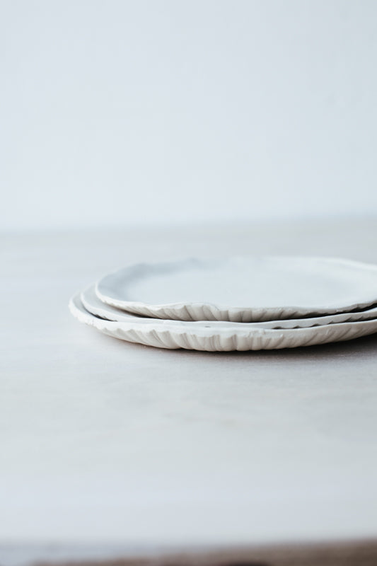 Raw organic plate by clay beehive