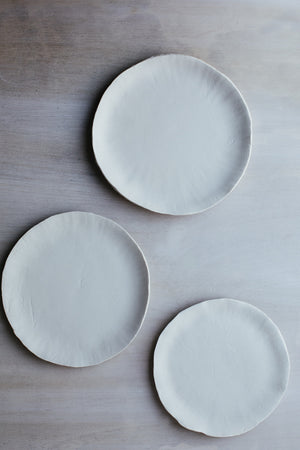 Raw organic plate by clay beehive