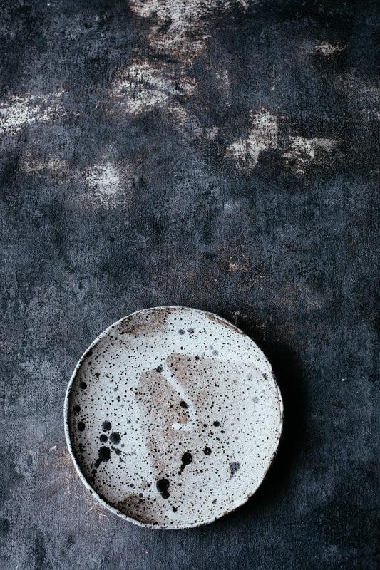 rustic bowl with black specks
