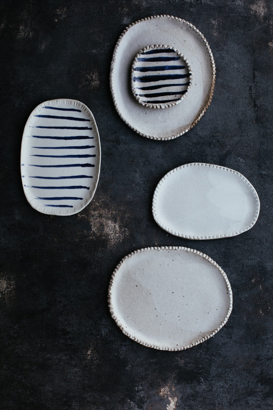 Rustic plates with a stripey duo