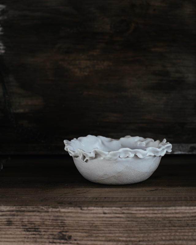 ruffled bowl with satin white glaze by clay beehive