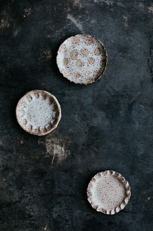 Rustic pink plates by clay beehive