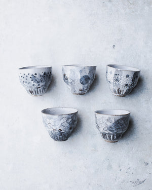 Carved rustic handmade yunomi style cups with grey/white glazing by clay beehive ceramics