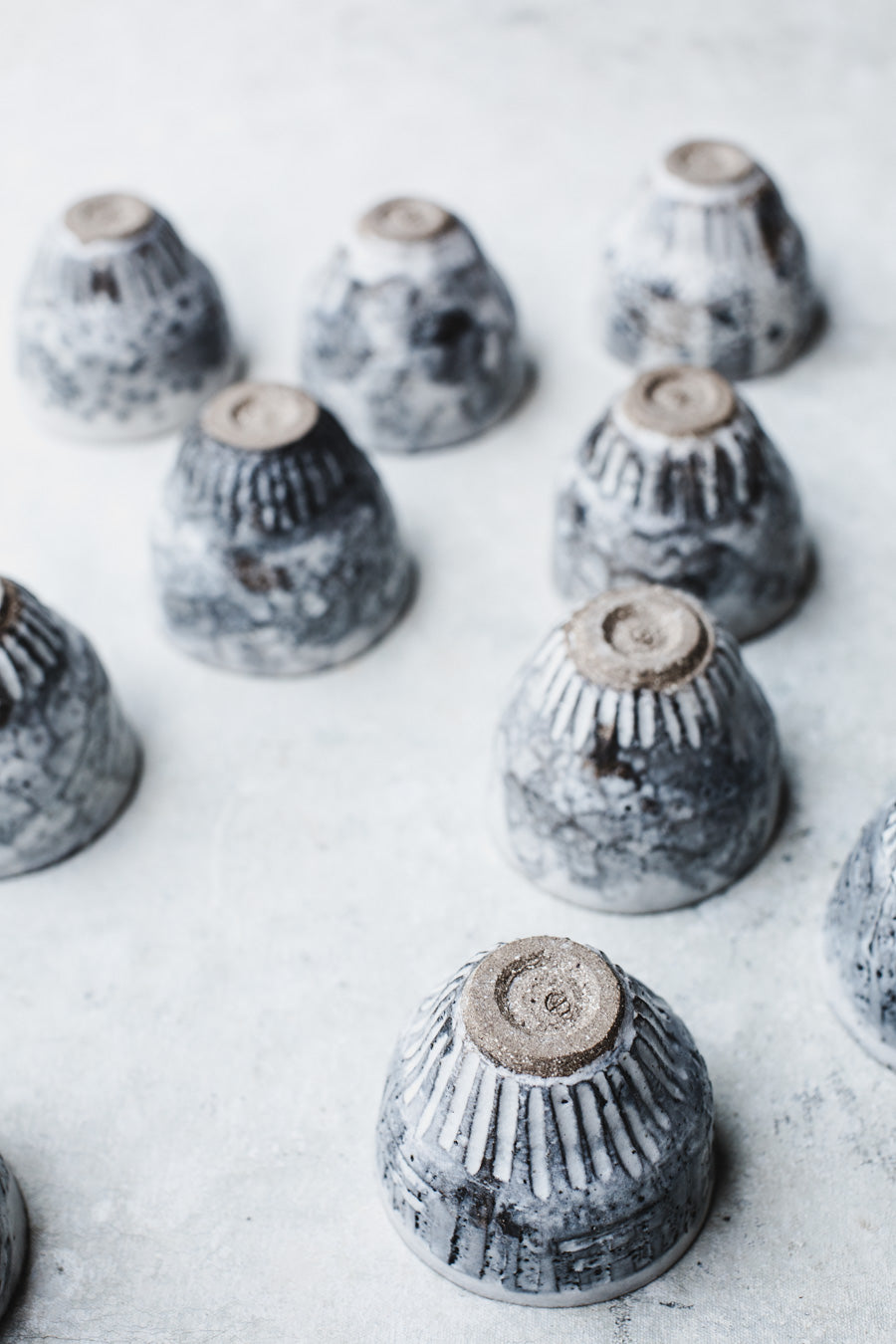 Carved rustic handmade yunomi style cups with grey/white glazing by clay beehive ceramics