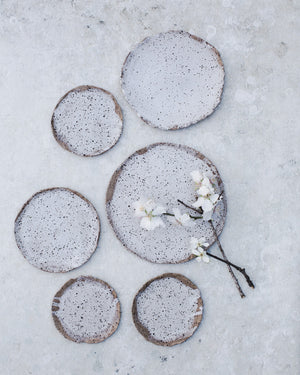 rustic organic speckled white handmade plates by clay beehive ceramics