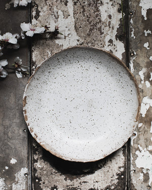 Rustic gritty low and wide ceramic white bowl handmade by clay beehive