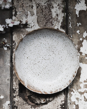 Rustic gritty low and wide ceramic white bowl handmade by clay beehive