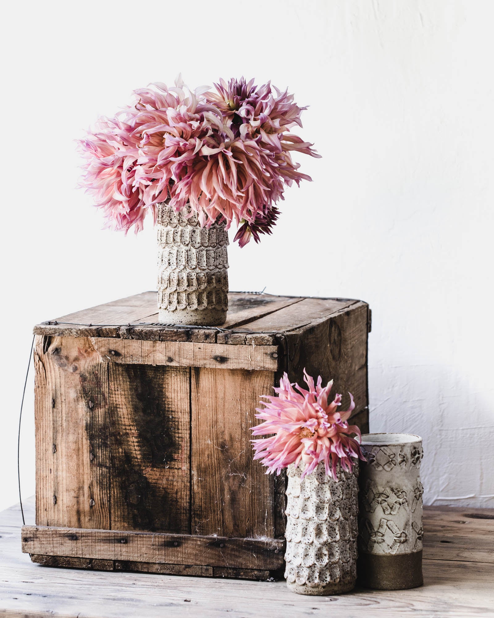 Handmade textured vases with a rustic speckled finish perfect for holding longer stemmed flowers and creating posies by clay beehive ceramics