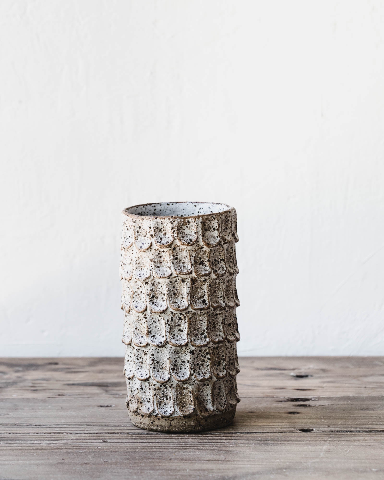 Handmade textured vases with a rustic speckled finish perfect for holding longer stemmed flowers and creating posies by clay beehive ceramics